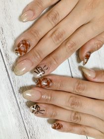 		スカルプチュア。チェックとリボン。